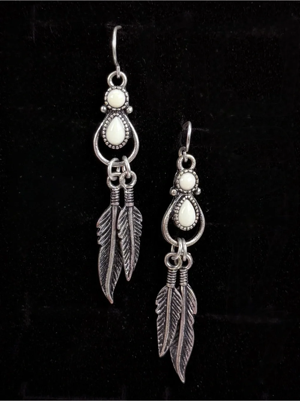Silvertone white leaf fringe pierced dangle earrings
